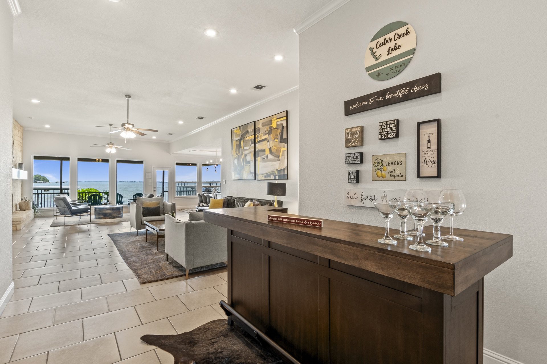 Self-serve bar with stunning open lake views—cheers to lakeside luxury!