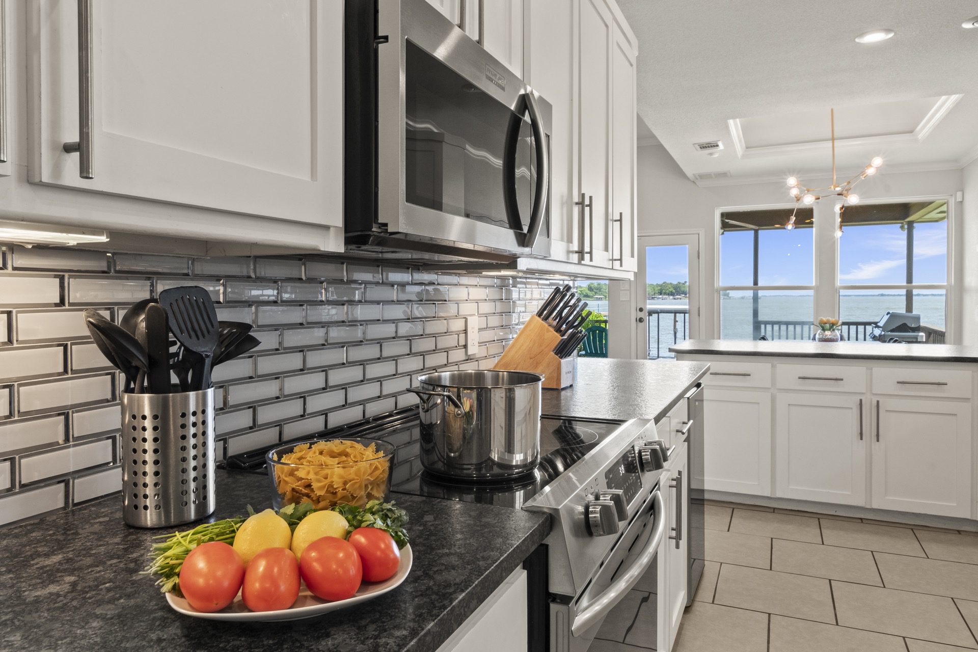 Ready for your culinary creativity—spacious kitchen with plenty of prep space to whip up meals using your own fresh ingredients.