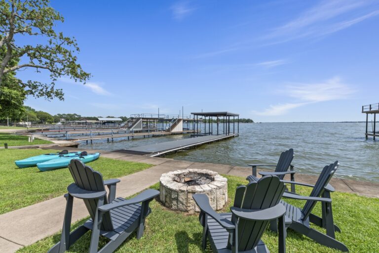 Gather around the firepit just steps from the lake—four chairs waiting for you to make s’mores and memories.