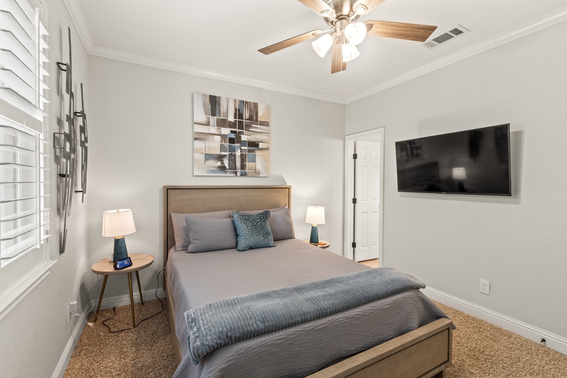 Bedroom #4: A private retreat featuring a queen bed, en-suite bathroom, and a 49-inch TV for added comfort and convenience.
