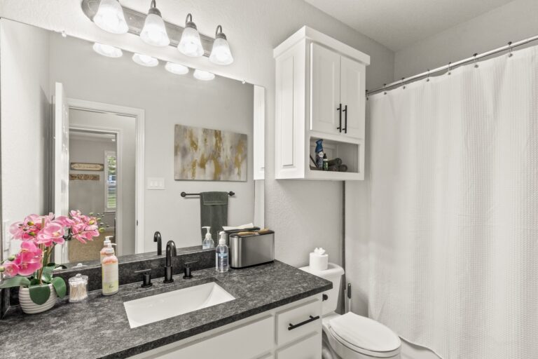 Elegant guest bathroom conveniently shared by Bedrooms #3 and #4, designed for comfort and style.