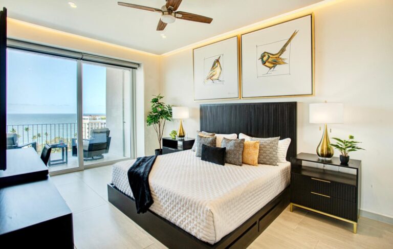 Sliding doors, ocean breeze, breathtaking views — and a bed so comfortable and beautifully appointed you'll have a hard time choosing between the balcony and sleeping in. The primary bedroom is pure indulgence from every angle.