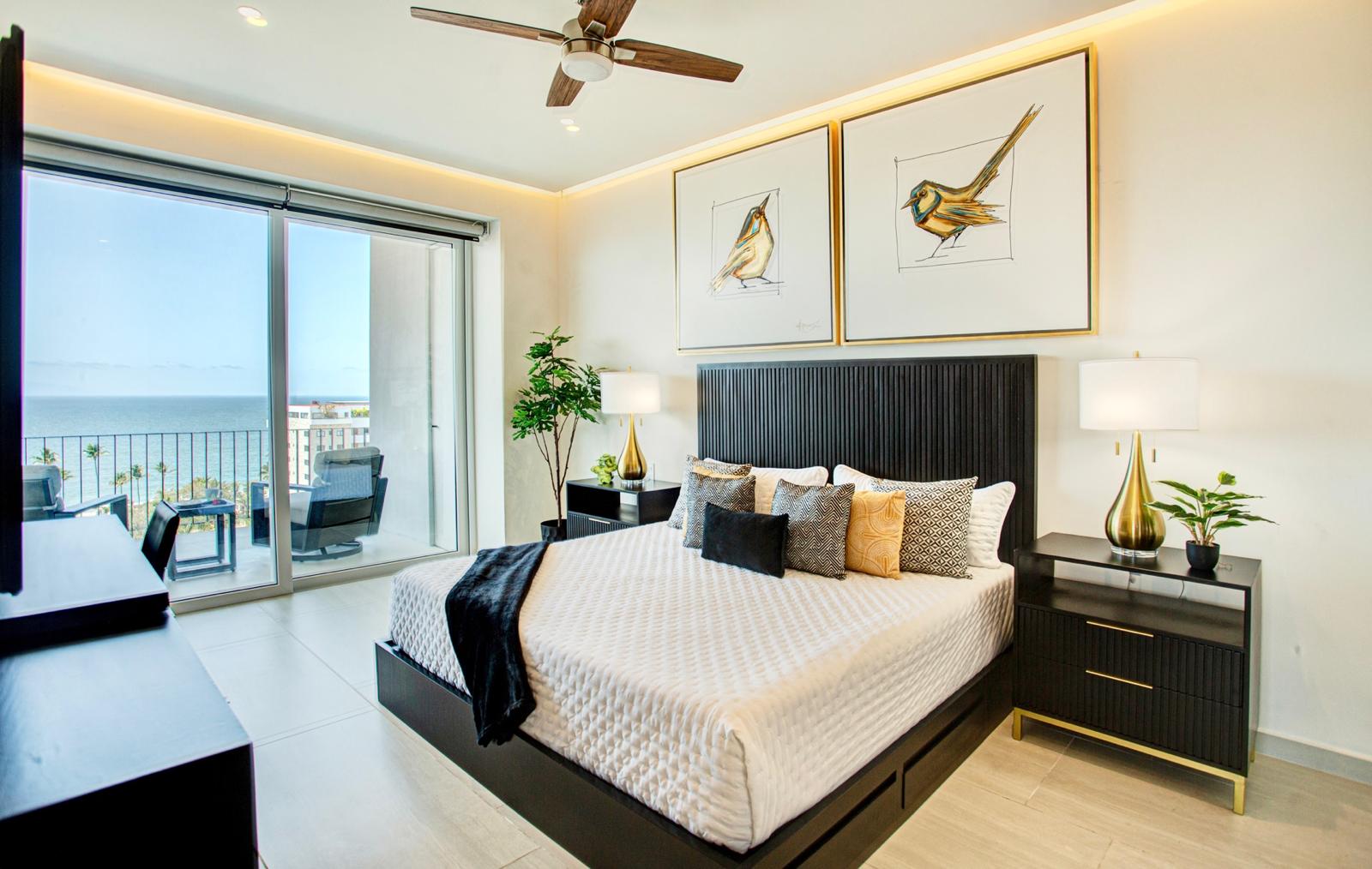 Sliding doors, ocean breeze, breathtaking views — and a bed so comfortable and beautifully appointed you'll have a hard time choosing between the balcony and sleeping in. The primary bedroom is pure indulgence from every angle.
