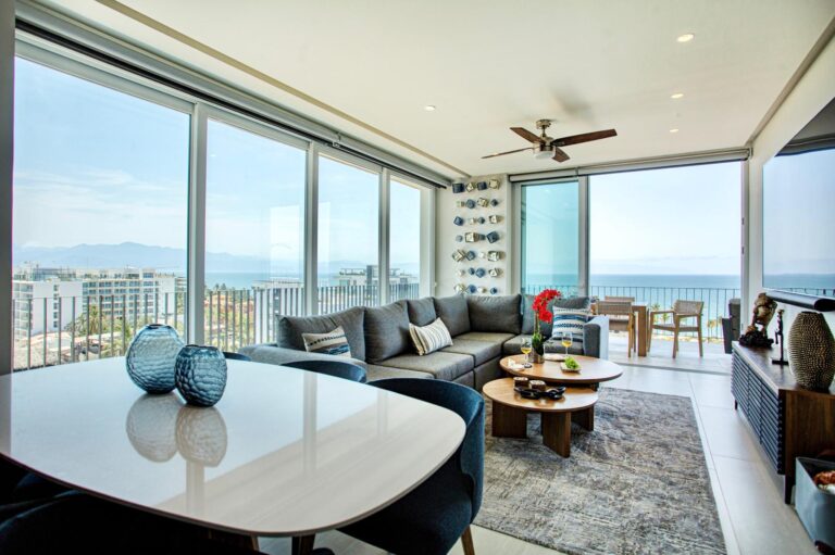 Dine in style — a six-seat dining table, buffet, island seating for three, and an eight-seat outdoor table mean this condo is always ready to entertain, inside and out.